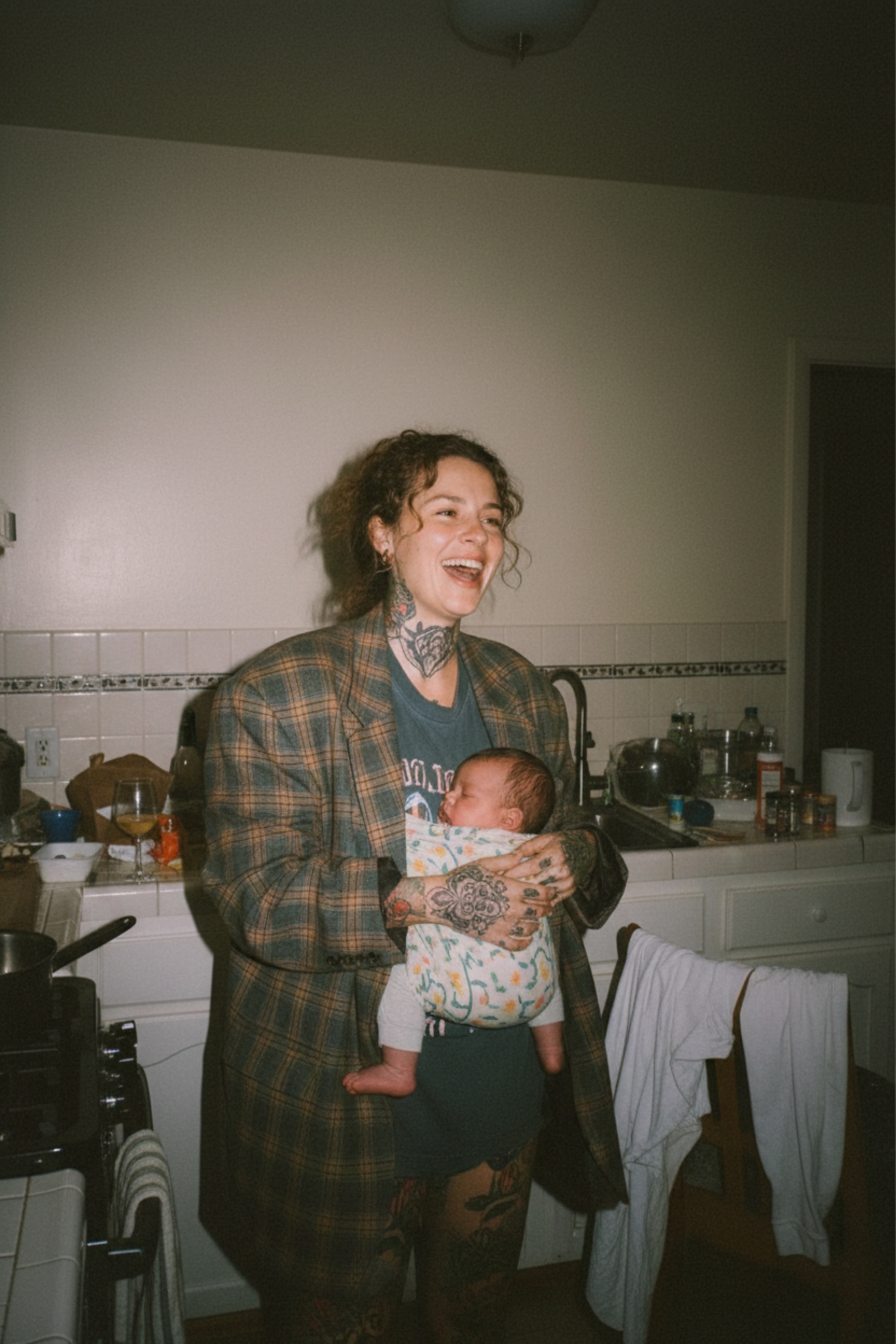 Parents cooking with their kids in the kitchen